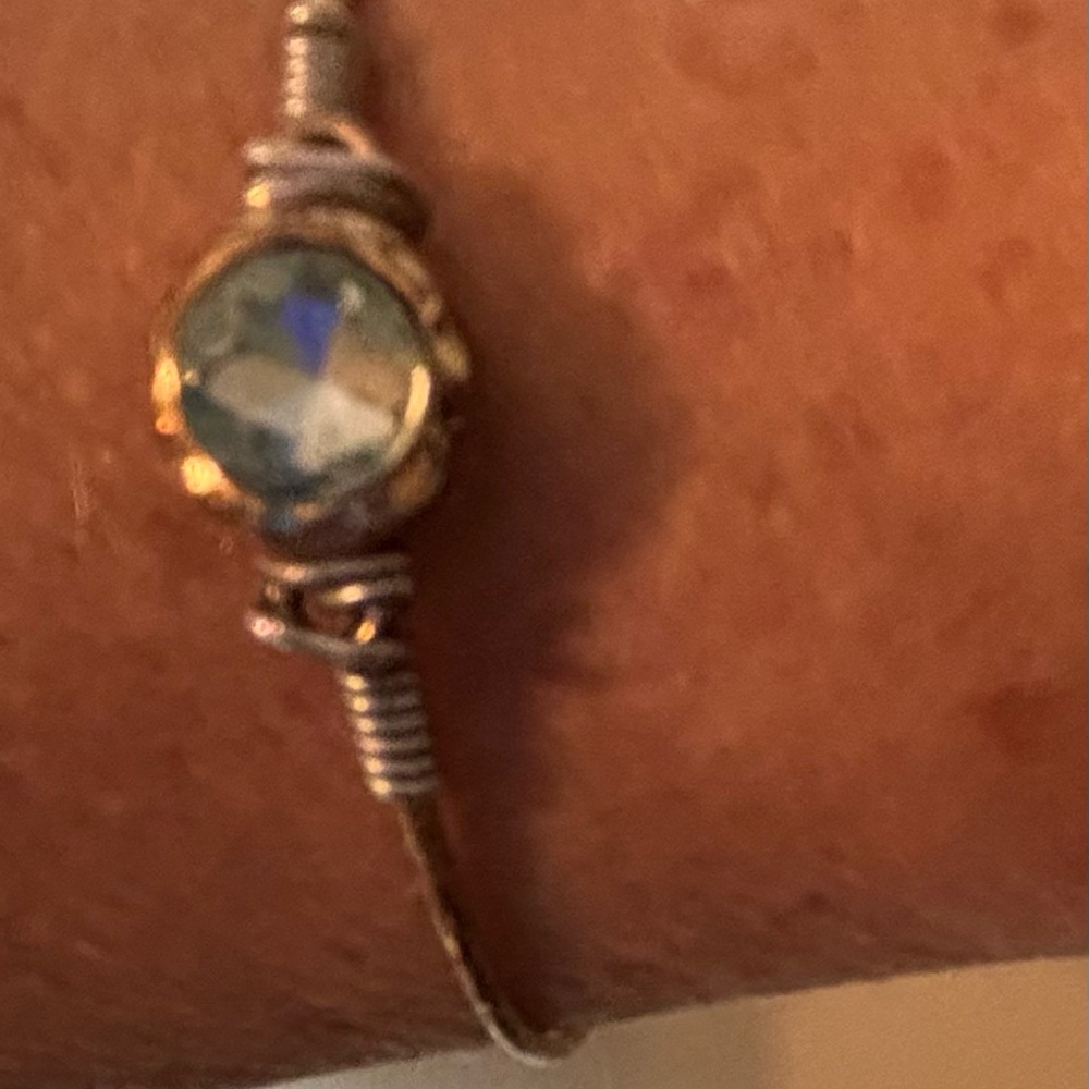 Boutique Gold bracelet with aqua blue stone